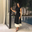 Black and white sleeveless langry fashion dress with high neckline