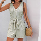Sleeveless green and white striped romper with button front and tie waist for summer fashion