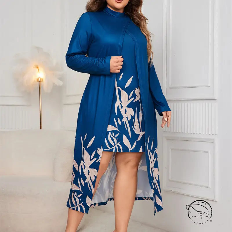 Faux two piece long sleeve dress with blue top and leaf skirt