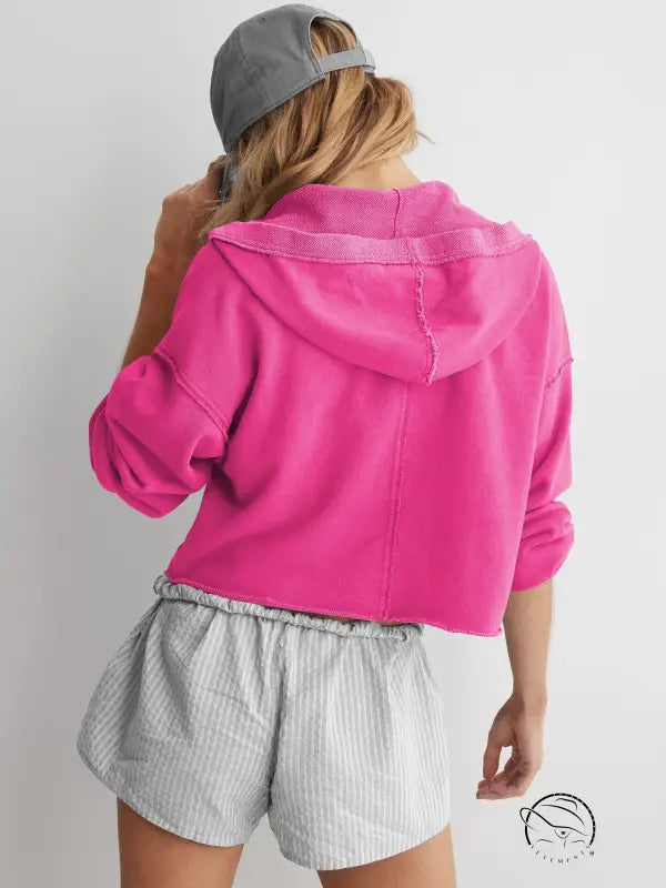 Hot pink cropped langry fashion hoodie with gray striped shorts and cap