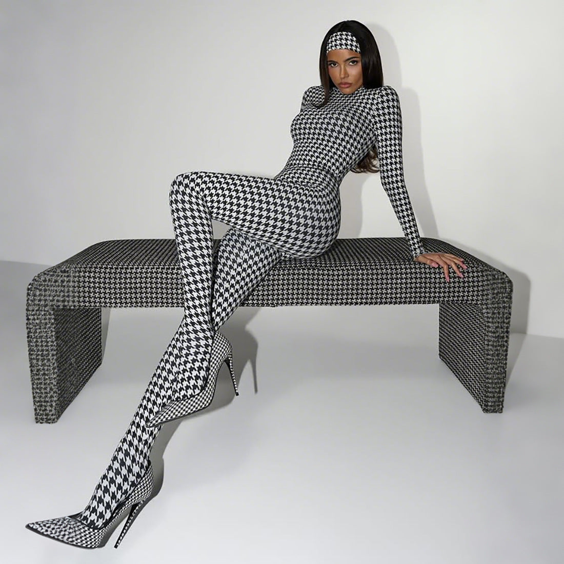 Langry fashion black and white houndstooth bodysuit with high heels