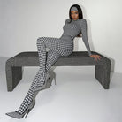Langry fashion black and white houndstooth bodysuit with high heels