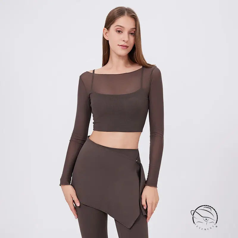 Sleek faux two piece mesh sports long sleeve cropped top with asymmetrical hem
