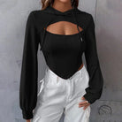 Slim short faux two-piece top: black cropped hoodie and fitted camisole with chest cutout and asymmetrical hem