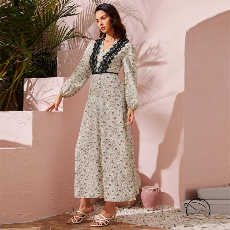 Woman in cute stitching lace high waist langry fashion dress with floral pattern