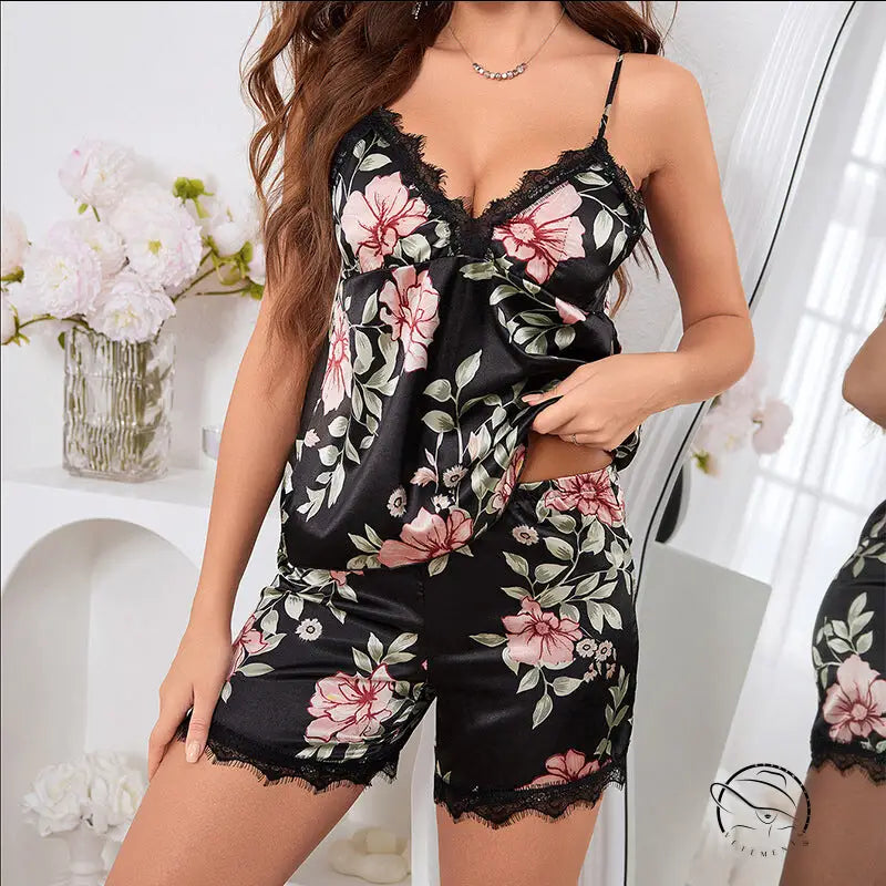 Black satin langry pajama set with pink green floral print and lace trim