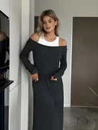 Langry fashion: black off-shoulder maxi dress with white tank top layering