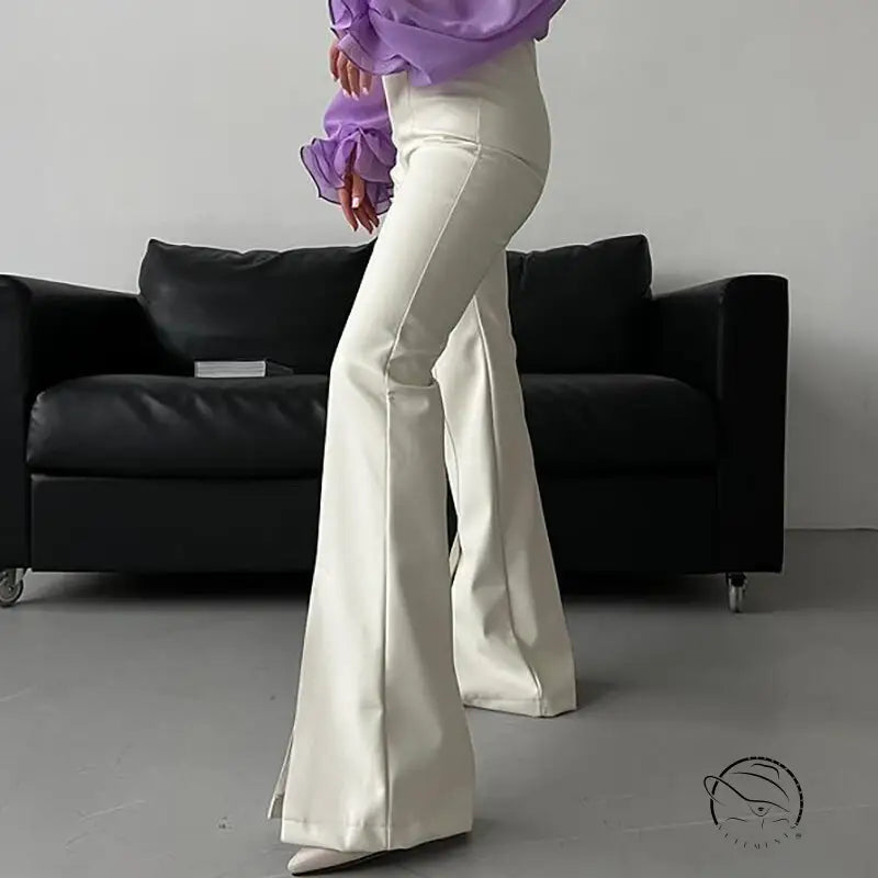 Cream-colored flared winter faux leather slit pants
