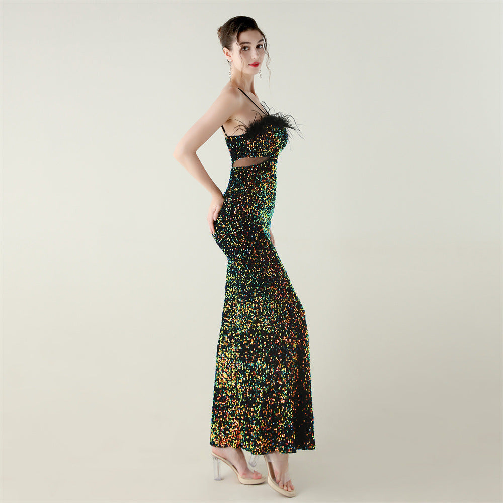 Green sequined strapless langry fashion gown with ostrich feather detail