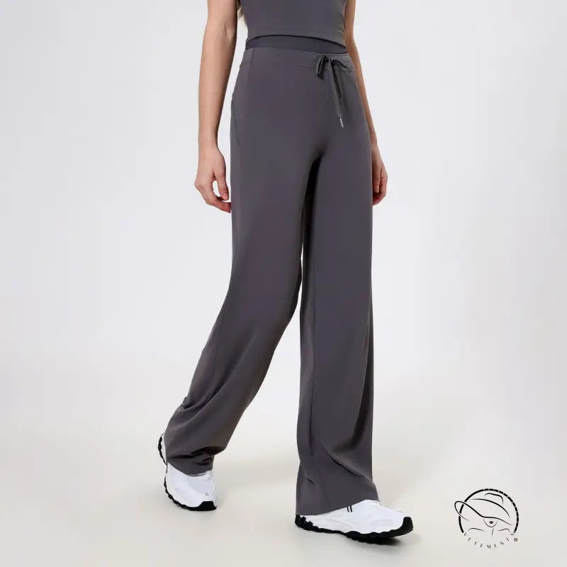 Gray langry wide-leg quick-drying athletic pants with drawstring waist and white sneakers