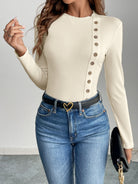 Cream ribbed Langry fashion jumpsuit with button front and long sleeves