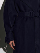 Sleek dark navy wool trench coat with belt and lapels from Langry fashion ملابس