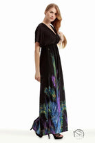 Holiday beach dress with black maxi style and colorful feather print