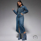 Woman in split denim maxi dress with front slit and platform boots