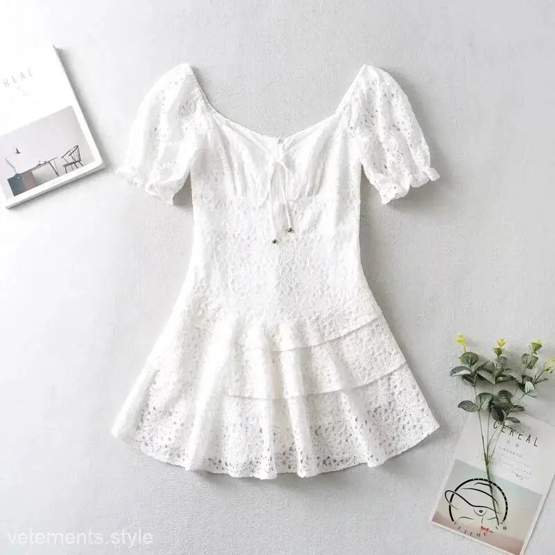 Elegant short lace white mini dress with lace-up details