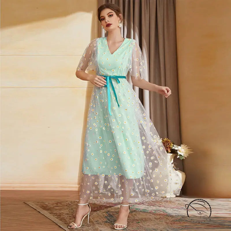 Enchanting high waist A-line fairy dress in mint green with daisy embroidery