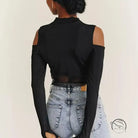 Gorgeous mesh stitching jumpsuit with black cold-shoulder crop top and light wash jeans