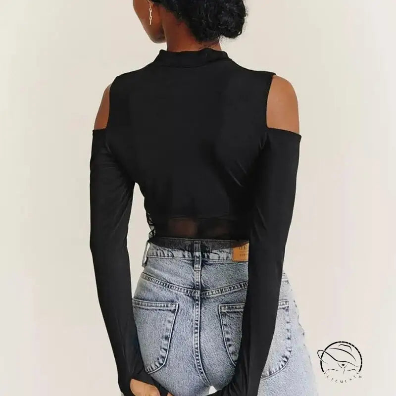 Gorgeous mesh stitching jumpsuit with black cold-shoulder crop top and light wash jeans