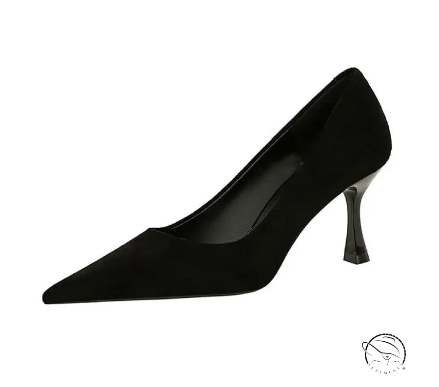 Black patent leather pointed toe pump with silver heel in Langry fashion
