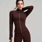 Brown long sleeve yoga jacket with finger stall stand collar and ribbed cuffs