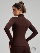 Brown long sleeve yoga jacket with high collar and finger stalls