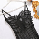 Black polka dot lace lingerie set with adjustable straps and floral pattern