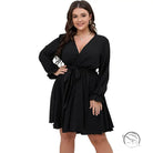 Black winter office midi dress with wrap style, tie waist, ruffled cuffs