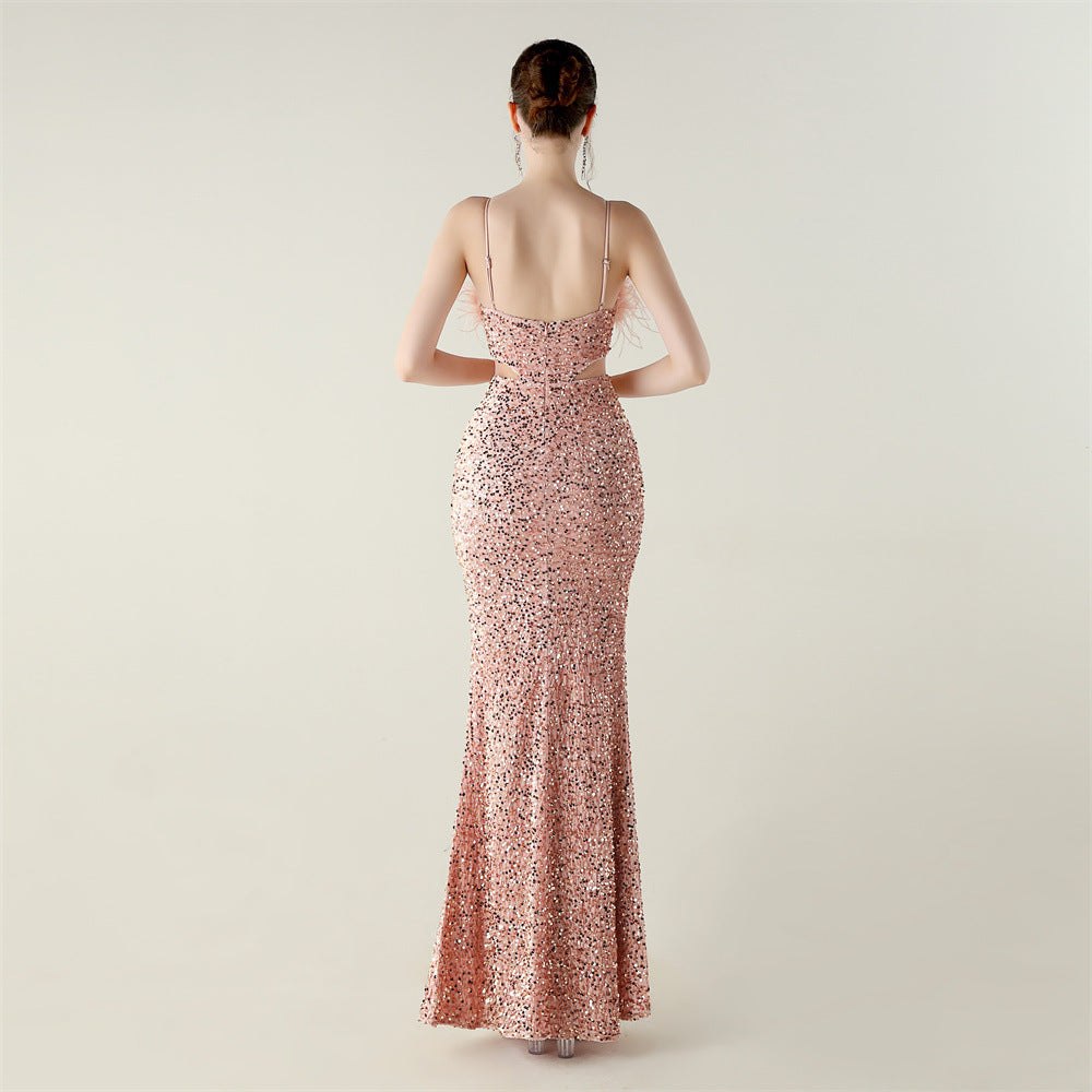 Langry rose gold sequined evening gown with ostrich feathers and open back