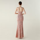 Langry rose gold sequined evening gown with ostrich feathers and open back