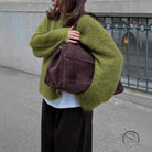Olive green fuzzy wool alpaca sweater with brown leather bag
