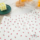 White elastic-waist langry skirt with red rose print for fashion homewear