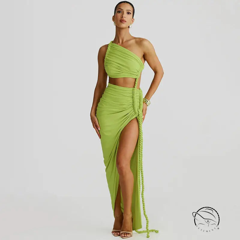 Stunning cutout lace pleated dress in green one-shoulder crop top skirt set