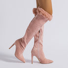 Pink thigh-high stiletto boots with faux fur trim, a stylish high leg boot