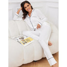 Women’s white button-up pajama set with black piping, stylish homewear fashion