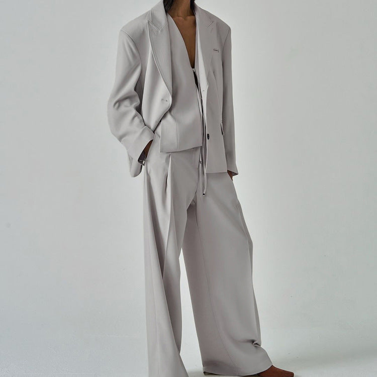 Sleek light gray long sleeve blazer set with wide-leg trousers