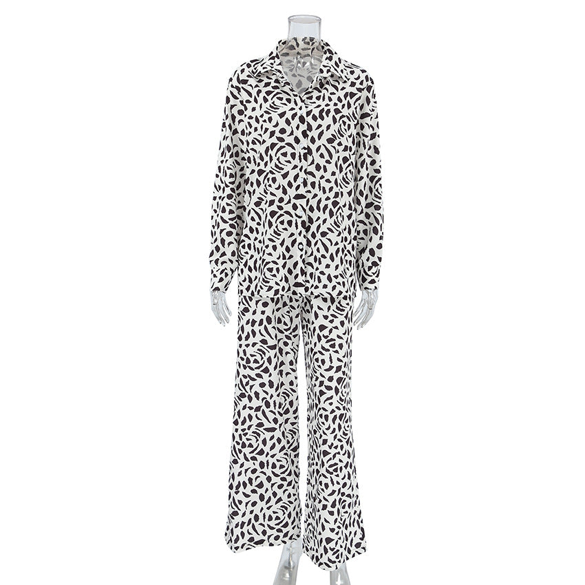 White long-sleeve button-up shirt and wide-leg pants set with loose leopard print pattern