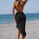 Black knitted beach skirt with ruffled hem, part of the Beach Three Layer Lotus Beveled Skirt Set