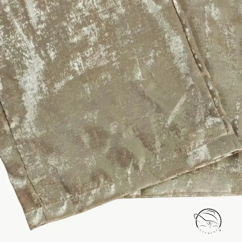 Langry fashion jumpsuit with gold shimmer blanket texture