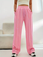 Pink pleated wide leg pants with pockets, elastic waistband, perfect for casual fashion