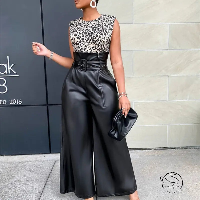 Woman in leopard print top and high waist faux leather pants
