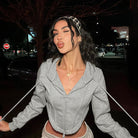 Langry fashion grey zip-up hoodie with gold necklace and headband