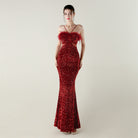 Red sequined mermaid gown in Langry fashion evening dress with ostrich feathers