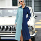 Woman in beautiful denim stitching dress with long sleeves and buttons