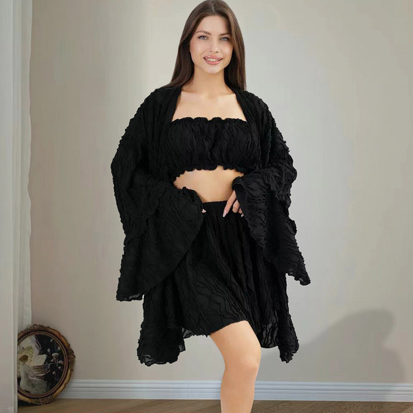 Women’s black ruffled three-piece loungewear set as a cute ruffled nightgown