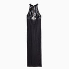 Black patent leather halter maxi dress with skull chest design by Langry fashion