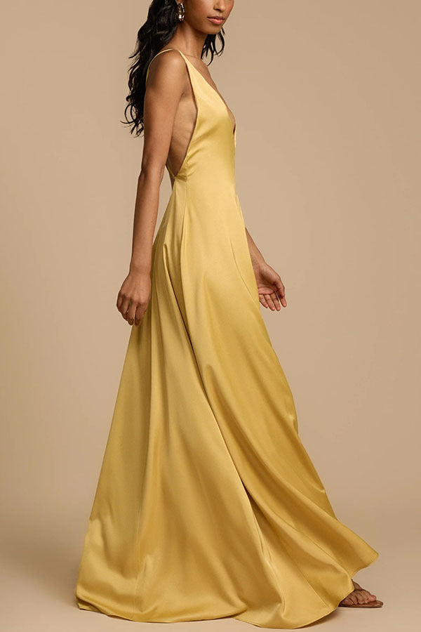 Mustard yellow satin maxi dress showcasing elegant fashion and luxurious langry style