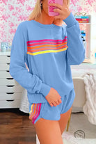 Light blue loose slim fit sweatshirt with rainbow stripes on chest