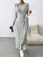 Stylish gray ribbed knit maxi dress with long sleeves and side slit