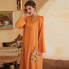 Beautiful langry fashion embroidered dress with bell sleeves and high neckline