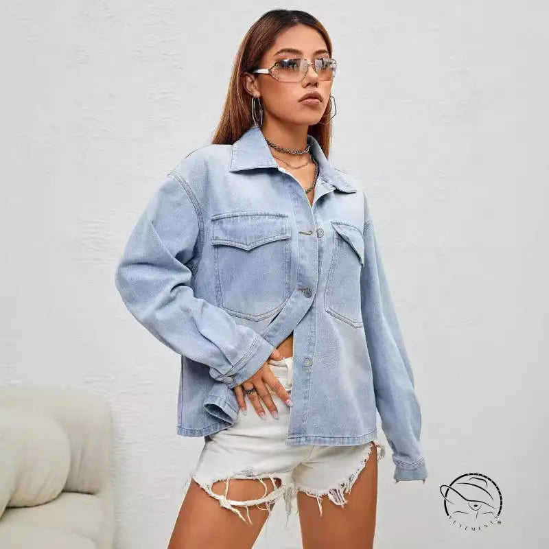 Light wash denim coat by Langry with button-up shirt style and chest pockets